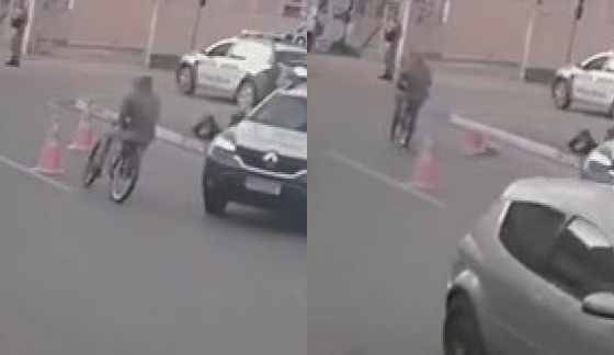 CICLISTA DERRUBANDO O CONE VG 29 0.JPG