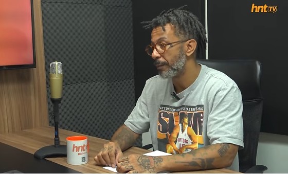 O artista visual Babu Sete Oito, grafiteiro de coração e mãos sujas de tinta.