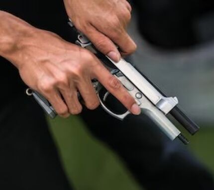 ARMA ENGATILHADA.jpeg